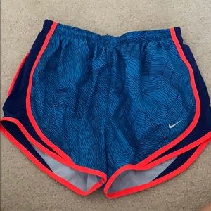 Blue patterned Nike shorts